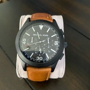 Men’s Micheal Kors watch.